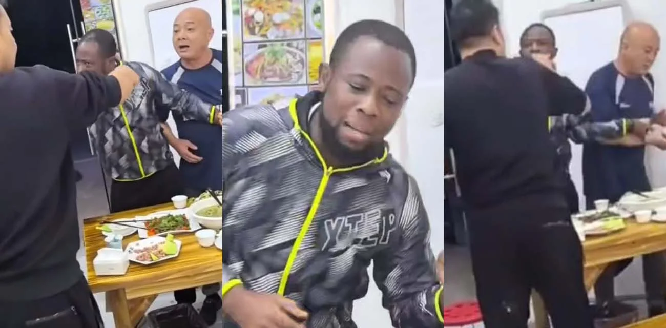 信阳淮滨黑哥们劝架 两男子饭店口角冲突 路人黑人小哥劝架 你再说黑哥们的语言是不通的？